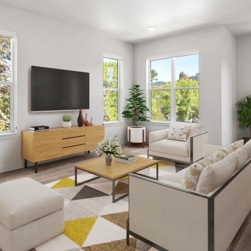 a living room with a tv and couches