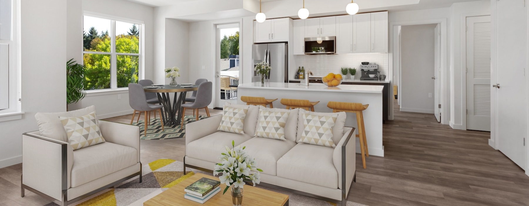 a living room with a couch and chairs