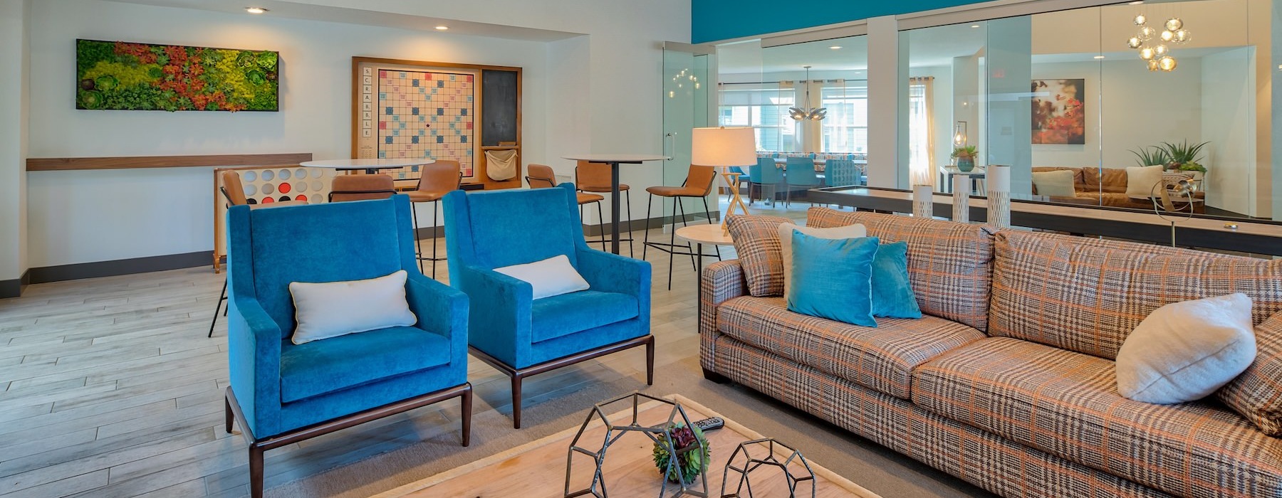 a clubroom with chairs and a couch