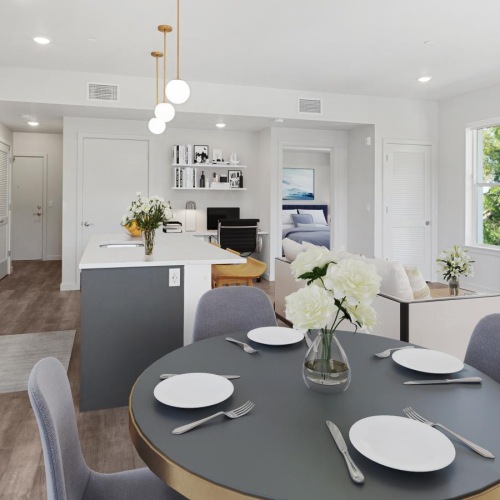 a large kitchen with a dining table